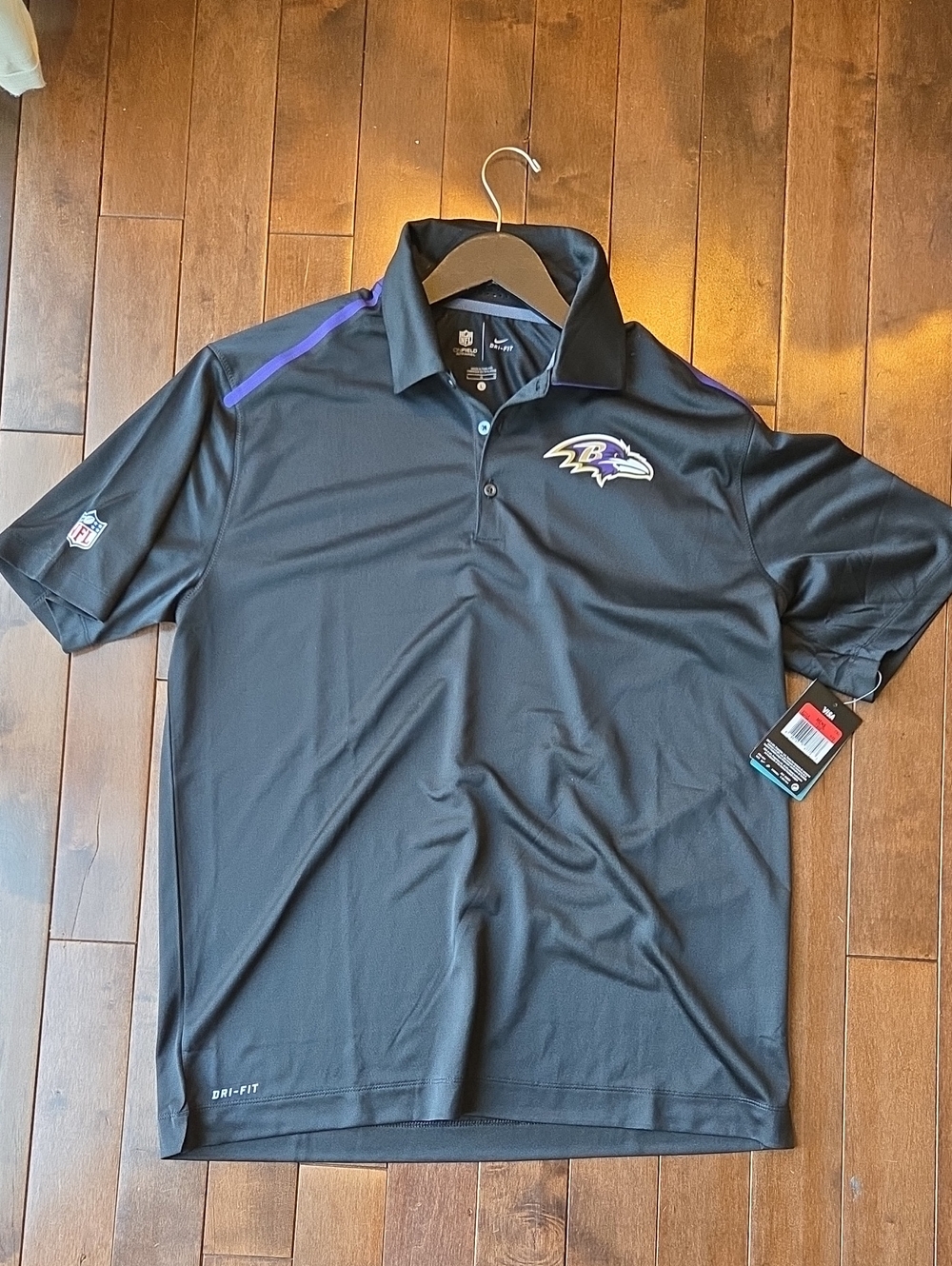 Nike Men's Black Polo with Purple Accent Baltimore Ravens Logo